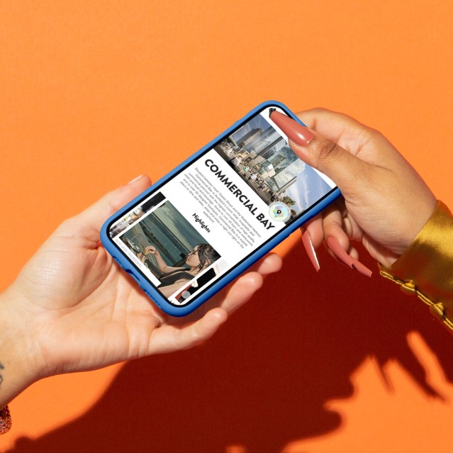Heart of the City website on a mobile phone being passed around