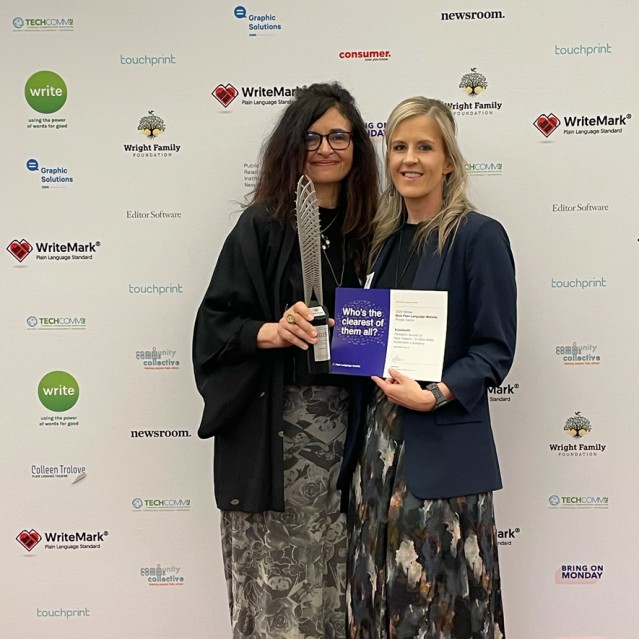 Katherine Lissienko and Dr Greta File accepting the award for 'Best Plain Language Website — Private Sector' at the 2025 Plain Language Awards.